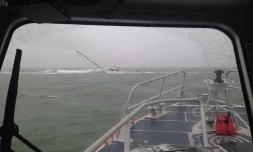 Coast Guard <a href="/USCG/">U.S. Coast Guard</a> rescues two from storm-tossed sailboat on Charleston jetties #chsnews counton2.com/story/29006522…