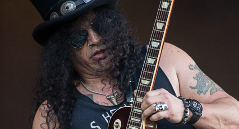 ultimateguitar's tweet photo. .@Slash seems quite open for a classic @gunsnroses reunion - http://t.co/DC2MPhmqpm http://t.co/6v6UTTZnAU