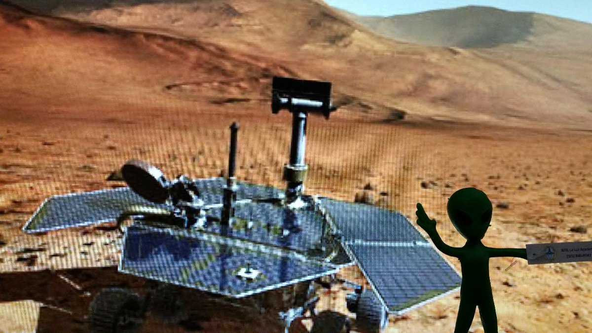 AFRLLLA's tweet photo. @AFRLMarsMission #MarsAmbassador - September  2014 - Marty waves goodbye to Opportunity before heading to Earth http://t.co/NOxcfj8UPq