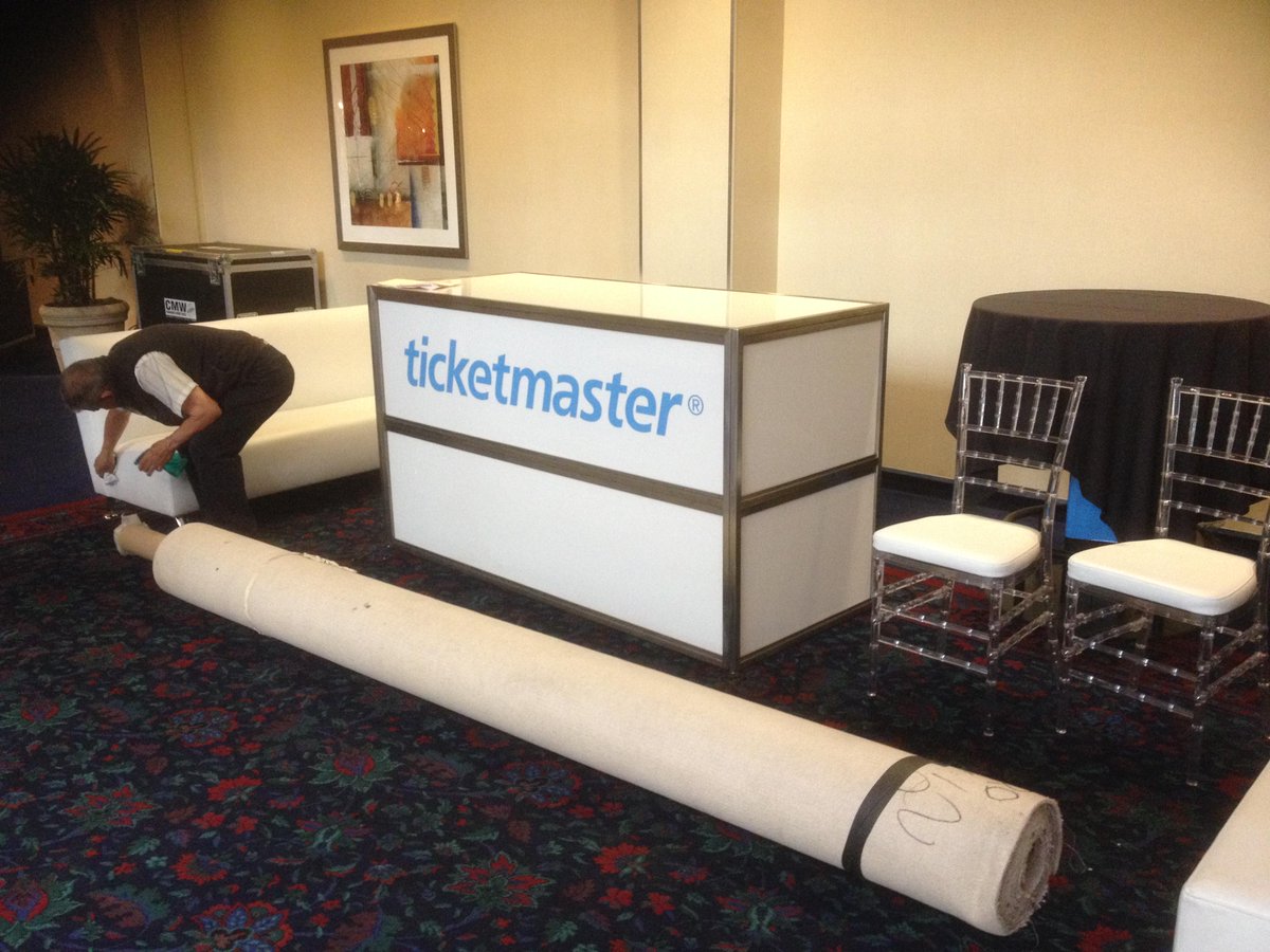 #sitra hard at work! Branded bar, grey carpet, chiavari chairs (with our custom made comfortable cushions) and sofa!