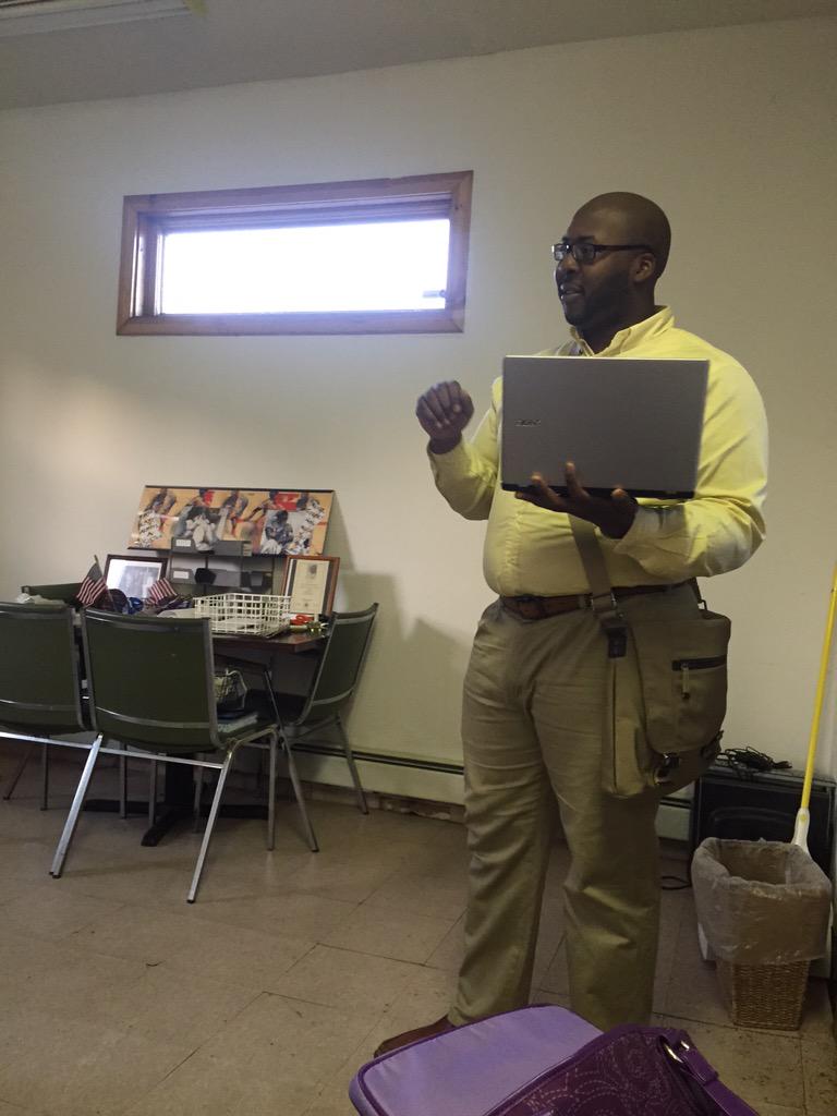 RIisREADY's tweet photo. @BrownUEP intern, Pierre Lucien, sharing his research with the @NAACP #PVD branch. http://t.co/A65Jm8qiU6