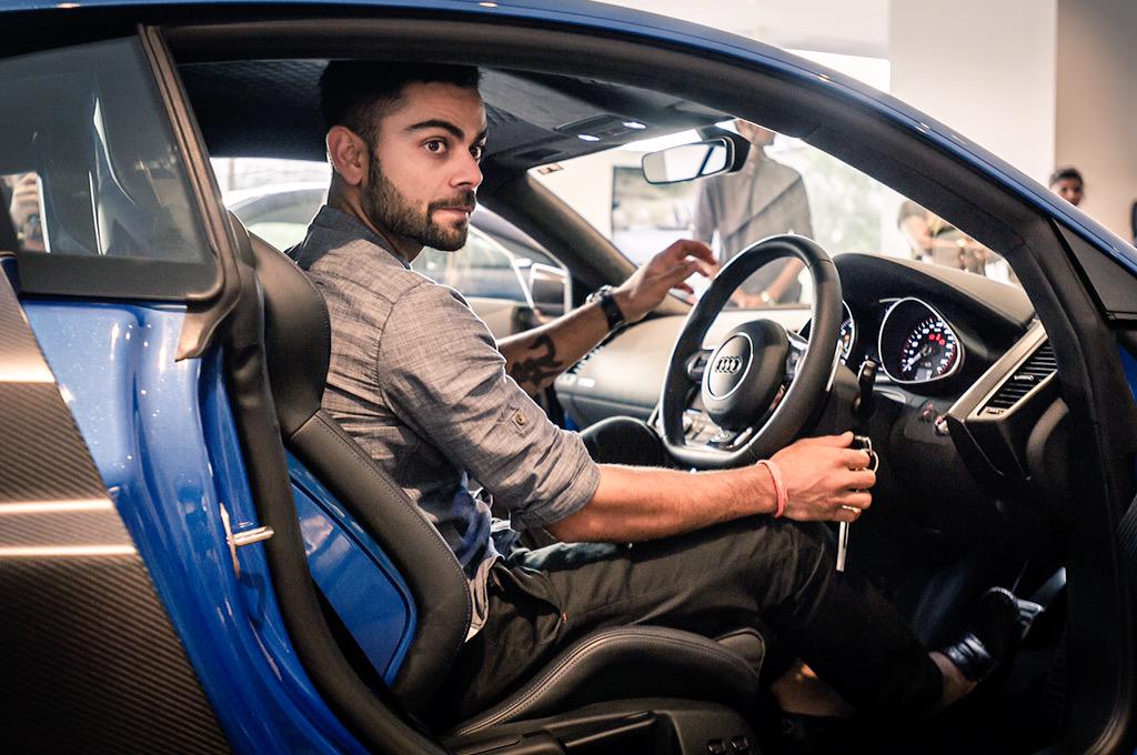 AudiIN's tweet photo. Here's @imVkohli, proud owner of the new Audi R8 LMX. One of the 99 rare beauties in the world. http://t.co/AorNaJ9AeH