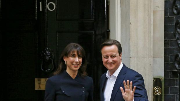 smh's tweet photo. UK Election 2015: PM David Cameron returns to Downing St victorious. http://t.co/YMFAspeRfS http://t.co/l3yp4QpTfM