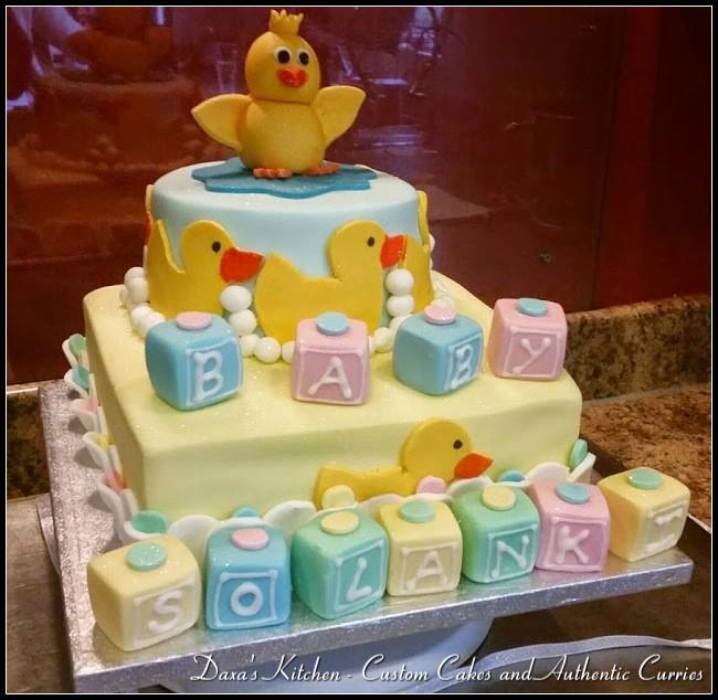 Daxaskitchen's tweet photo. A recent #Babyshower cake that was a duck themed party! Top layer chocolate, bottom layer vanilla! http://t.co/ffFit4ep63