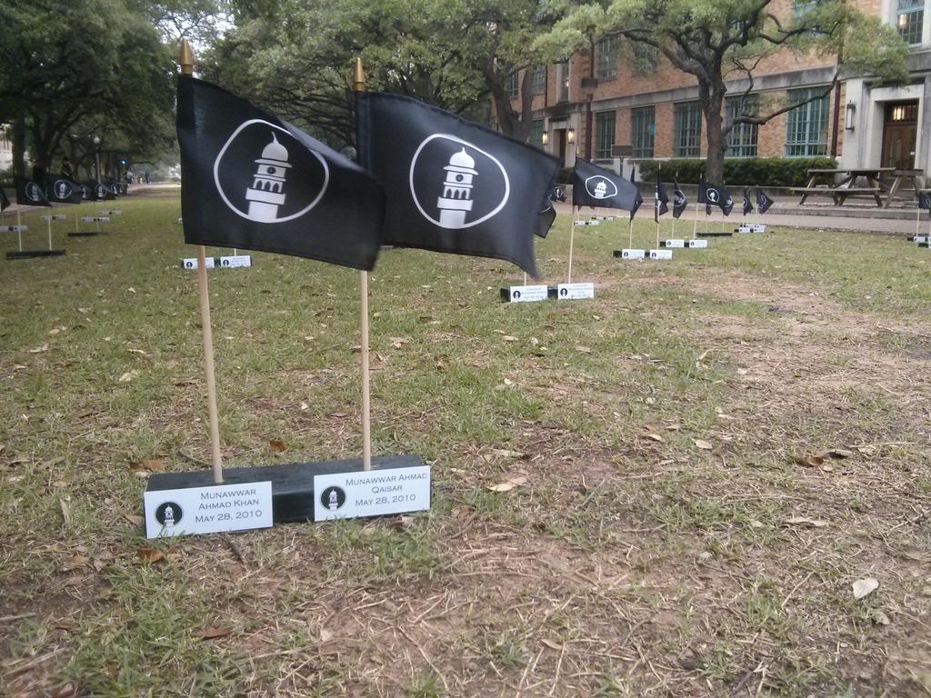 TexasAMSO's tweet photo. Memorial for #LahoreAttacks of May 2010 @UTAustin. 87 flags w/ 87 names. @AhmadiyyaTimes @MuslimPresident @mkagulf http://t.co/P04KoxMDrr