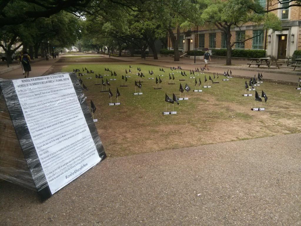 TexasAMSO's tweet photo. Memorial for #LahoreAttacks of May 2010 @UTAustin. 87 flags w/ 87 names. @AhmadiyyaTimes @MuslimPresident @mkagulf http://t.co/P04KoxMDrr