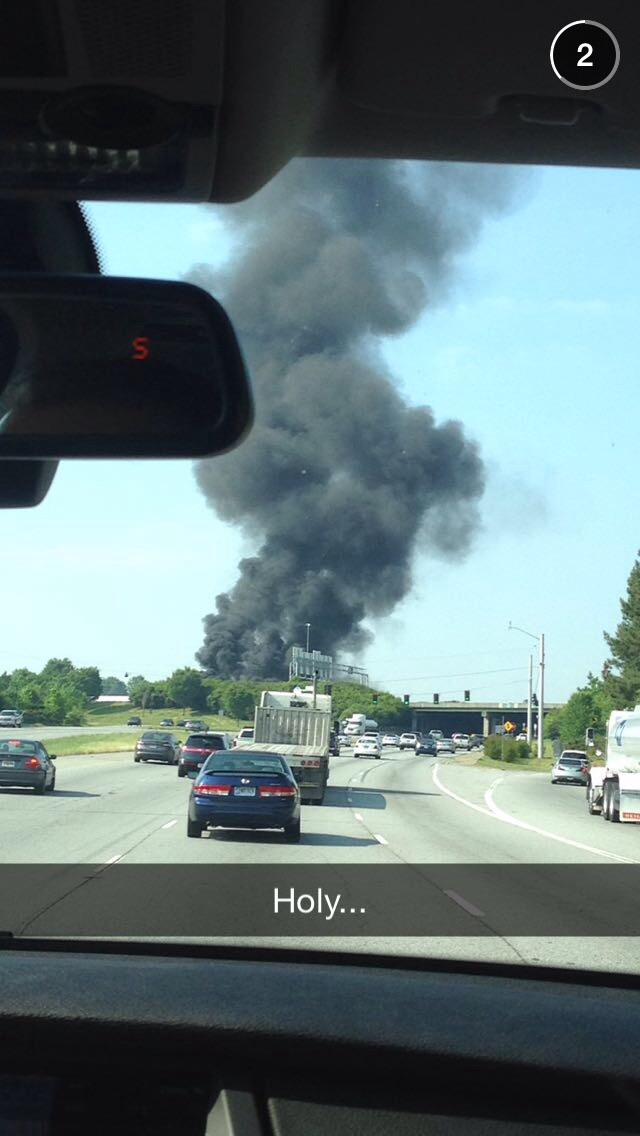 GAFollowers's tweet photo. Smoke on I-285 from today’s plane crash that left 4 people dead. #RIP http://t.co/sUM7nYC34h