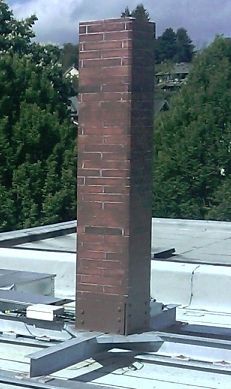 MyCellTower's tweet photo. @SACWireless Faux chimneys on brick buildings. If done right, it's a great way to camouflage a site. #stealthtower http://t.co/zT1WV4lq4f