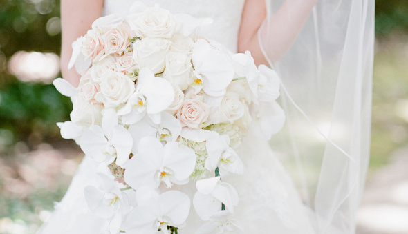 Cascading rose and orchid bouquet: stylemepretty.com/2015/04/17/rom… 
Photo: Ashley Upchurch