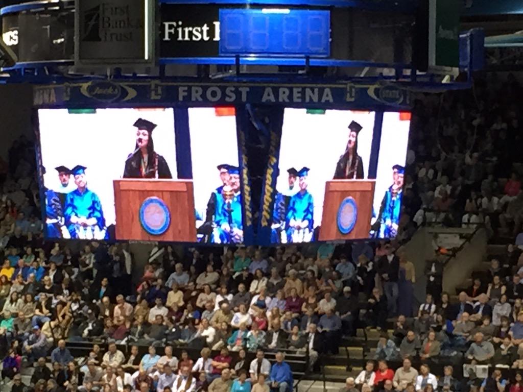 SDStateCAFES's tweet photo. Range Science major Kelsey Ducheneaux speaks on behalf of #sdstate15 graduating class! @SDSUAgBio is proud of Kelsey! http://t.co/wOBjX3zzO3