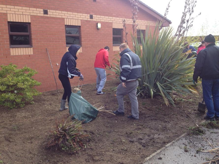 Out in the community today at a local school helping them with gardening.