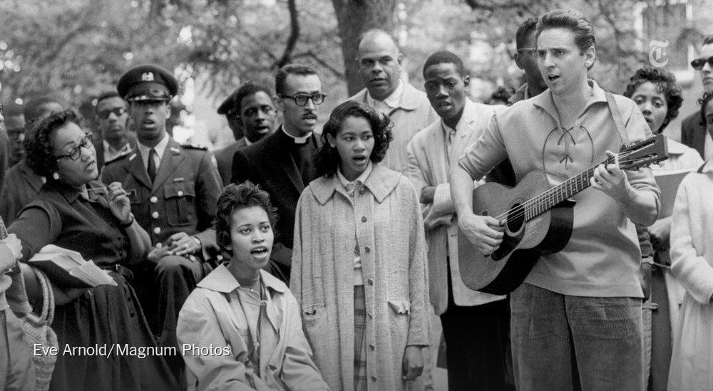nytimes's tweet photo. We shall overcome. 
We shall overcome. 
We shall overcome someday.
http://t.co/HW2IgDaCxm http://t.co/cAJFpf83nV