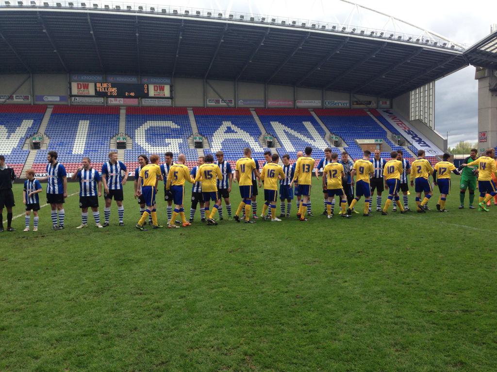 LaticsOfficial's tweet photo. The teams are out for the first @Intersport_UK Community Cup at the @DWStadium #wafc http://t.co/KttDPakmUv