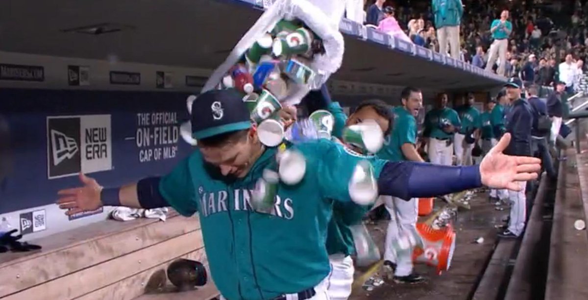 BleacherReport's tweet photo. VIDEO: @Mariners’ Nelson Cruz dumps garbage on teammate Logan Morrison after walk-off home run http://t.co/grhpkXA4XX http://t.co/Wqn3N0G4is
