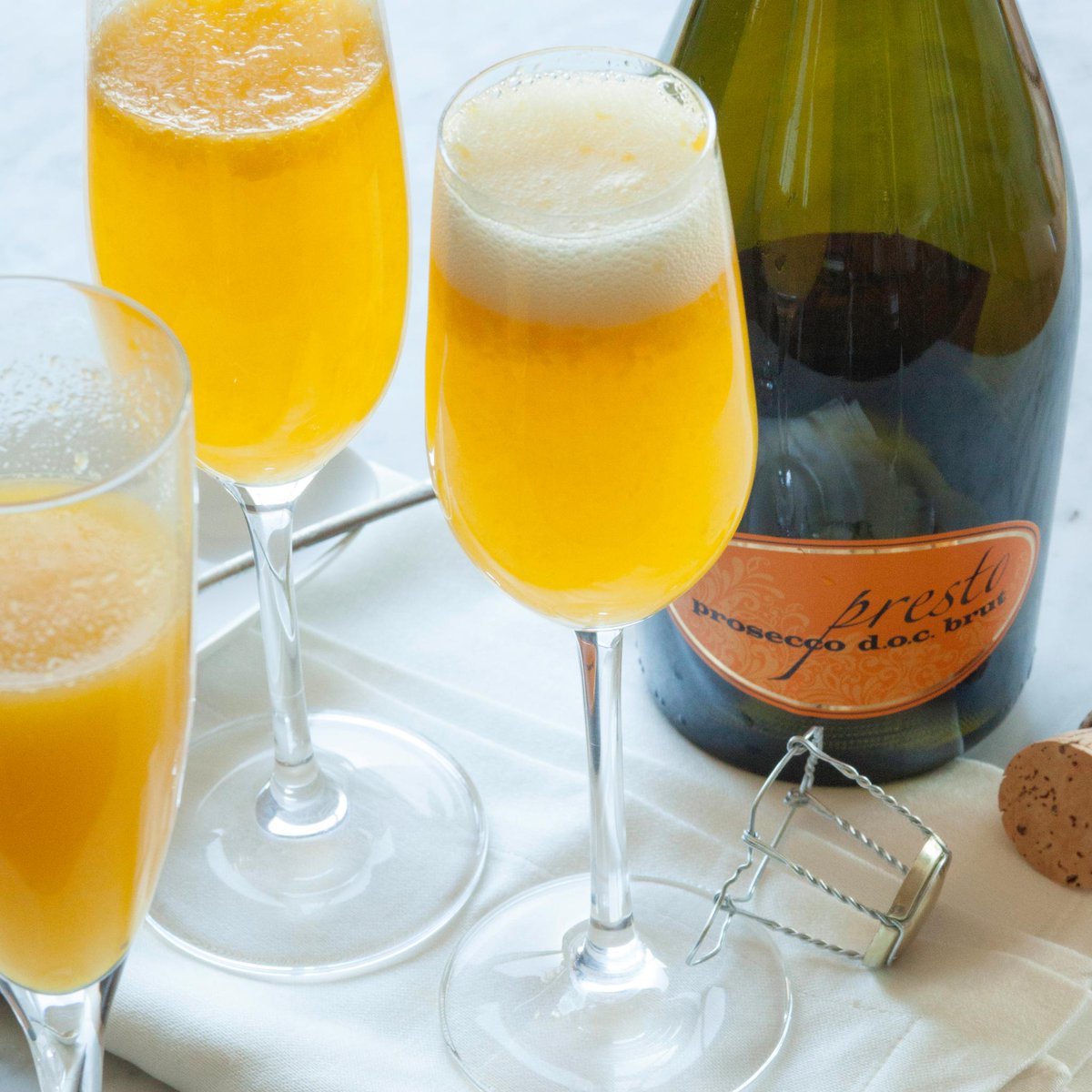 WholeFoods's tweet photo. Wake Mom up this weekend with one of these... Mango Mimosa: http://t.co/M3OjcXezjm #MothersDay http://t.co/LVwssxpnKT