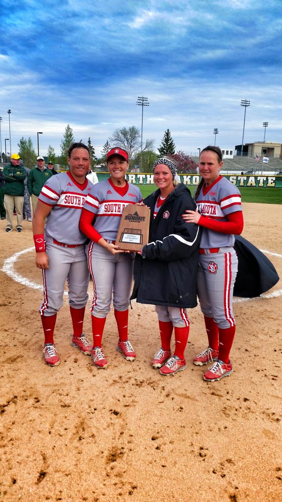 The Coyote captains accept the Summit League runner up award to bring back to Vermillion! PROUD OF OUR COYOTES!