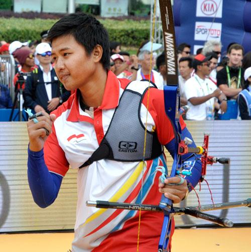 worldarchery's tweet photo. Riau Ega Agatha! Beats Lee Seungyun to #WCShanghai bronze. http://t.co/Q5cMsJBxUb