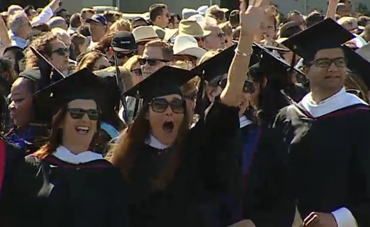 LoyolaMarymount's tweet photo. "Pomp & Circumstance" is playing and our #LMU15 grads are filing into Sunken Garden! http://t.co/o5ScrGbxmx