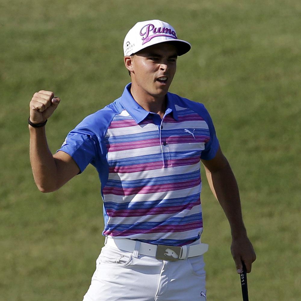 GolfDigest's tweet photo. He makes it! @RickieFowlerPGA is your 2015 Players champion!!! http://t.co/6BnE3xi0N6 http://t.co/4moLlJNybr