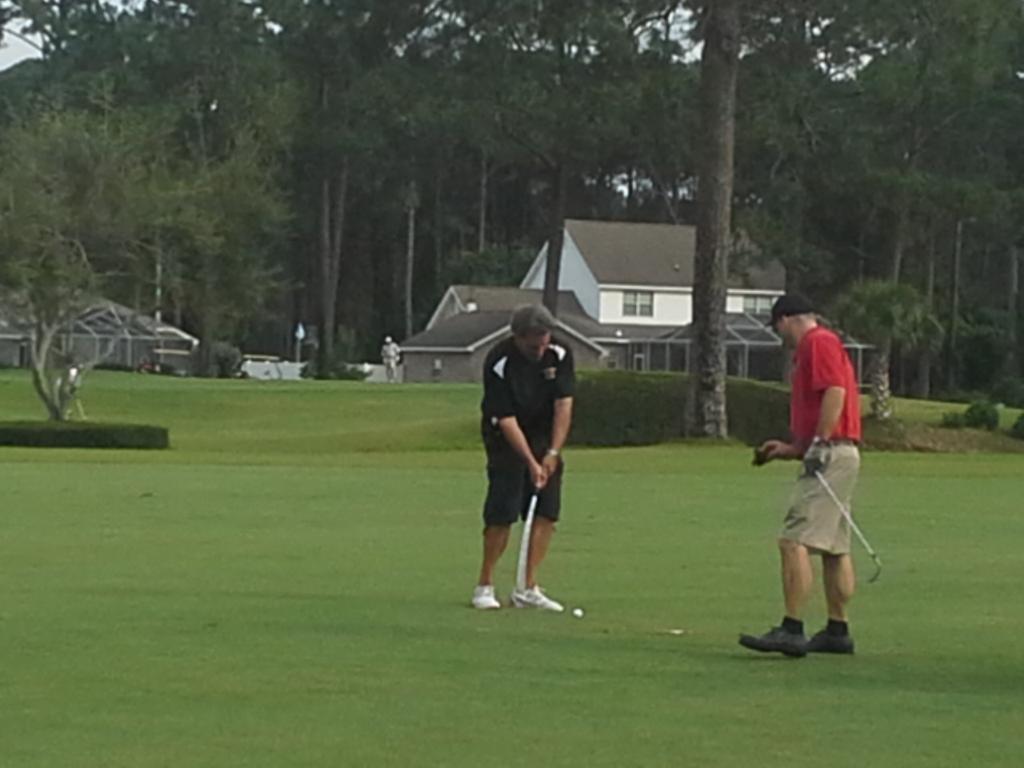 bayhighfootball's tweet image. Coach Jimmy Longerbeam ready to take a shot. @BarryHoover gives him pointers. #HeadCoach #OffensiveCoordinator