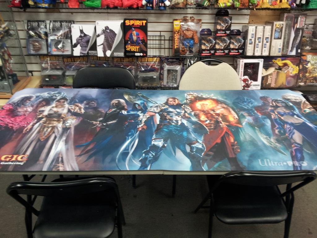 OneMillionComix's tweet photo. Our VIP table mat has just arrived! Both Chris and Brandon are in awe of its awesomeness. http://t.co/CZgG7pm4zh