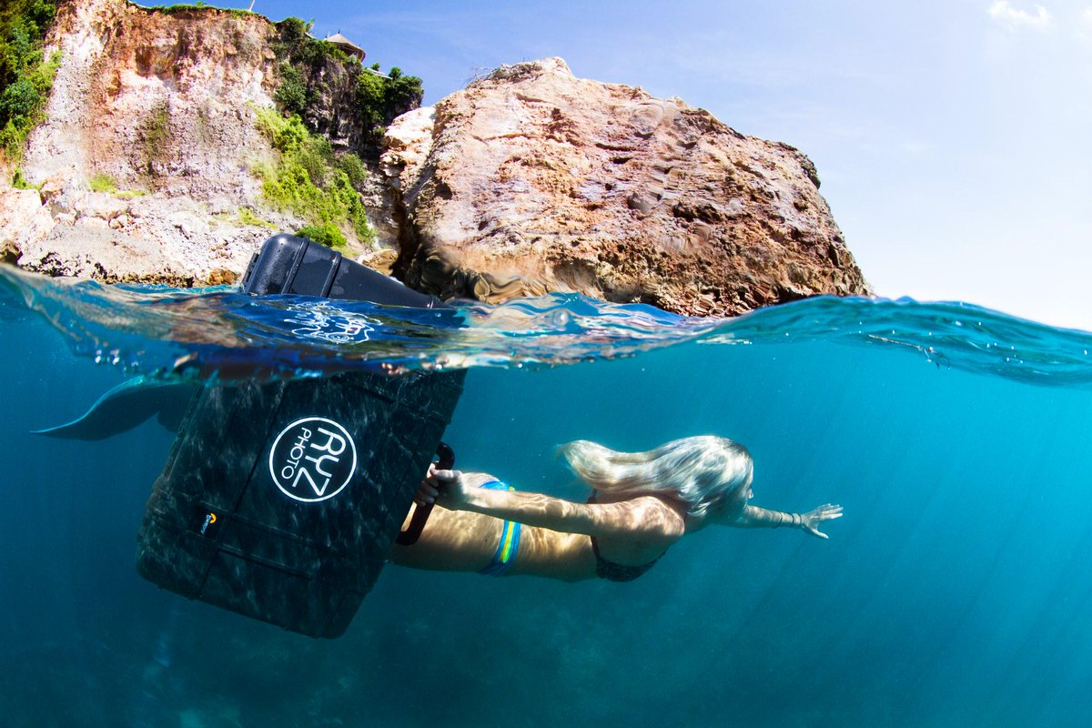 Lowepro's tweet photo. Looks like a #mermaid made off with @ryzphoto's new waterproof #Hardside.  
#TrustedToExtremes http://t.co/MWfBmLqLMm http://t.co/kFi18gLIjQ