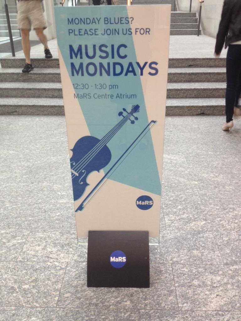 A sign in the MaRS Discovery District advertising Music Mondays.