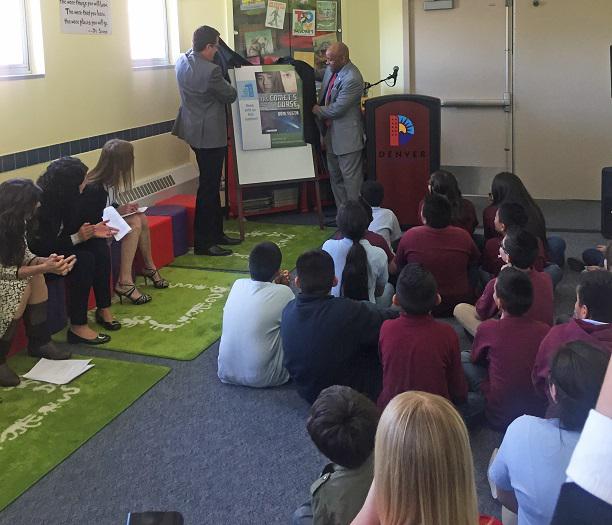 MayorHancock's tweet photo. Denver Literacy Week w/ the unveiling of The Comet’s Curse by Dom Testa, 2015 Youth One Book, One #Denver selection! http://t.co/V3wXZJnuh6