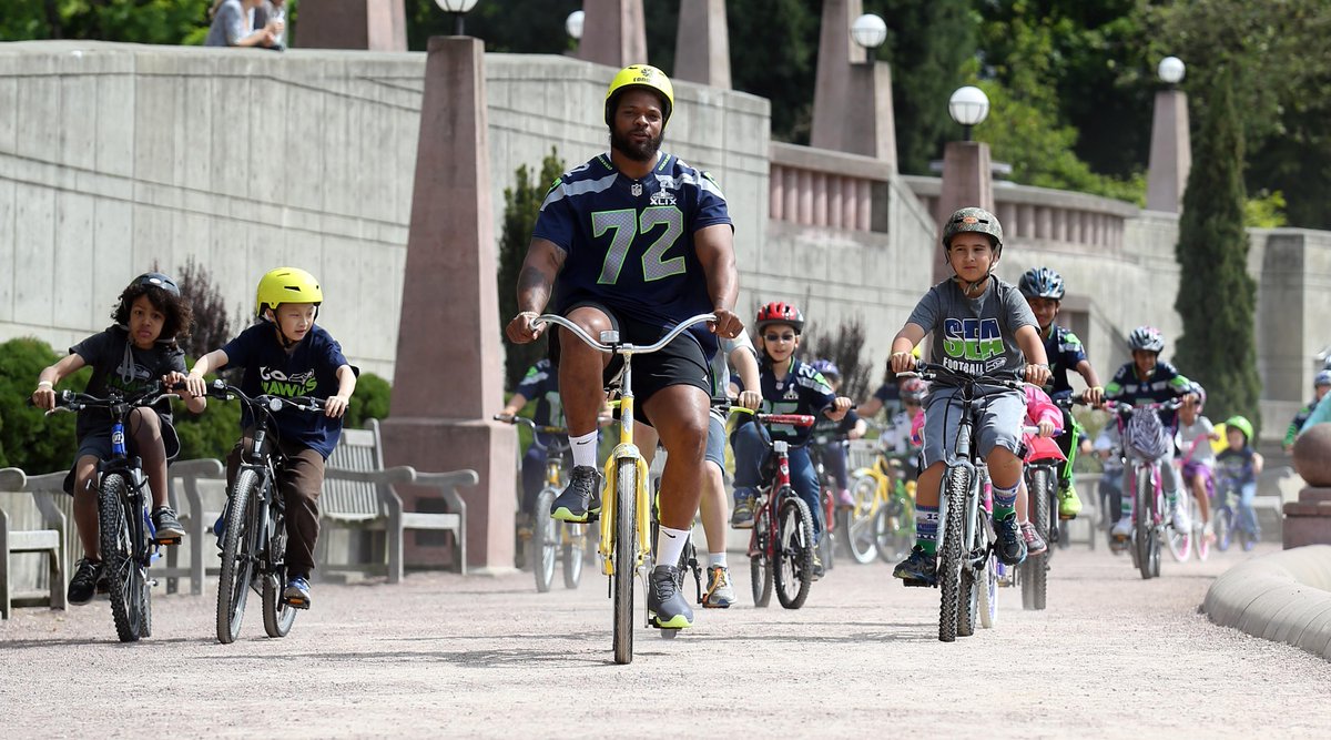 Seahawks's tweet photo. PHOTOS @mosesbread72's 'The Bennett Foundation' invites local youth on bike ride: [http://t.co/wx2ccN9qyV] http://t.co/JXcYwLTftd