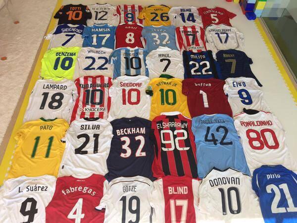 FootballFunnys's tweet photo. Gerard Pique shows off the shirts he's collected throughout his career. Amazing! http://t.co/U3SN1bYOOY
