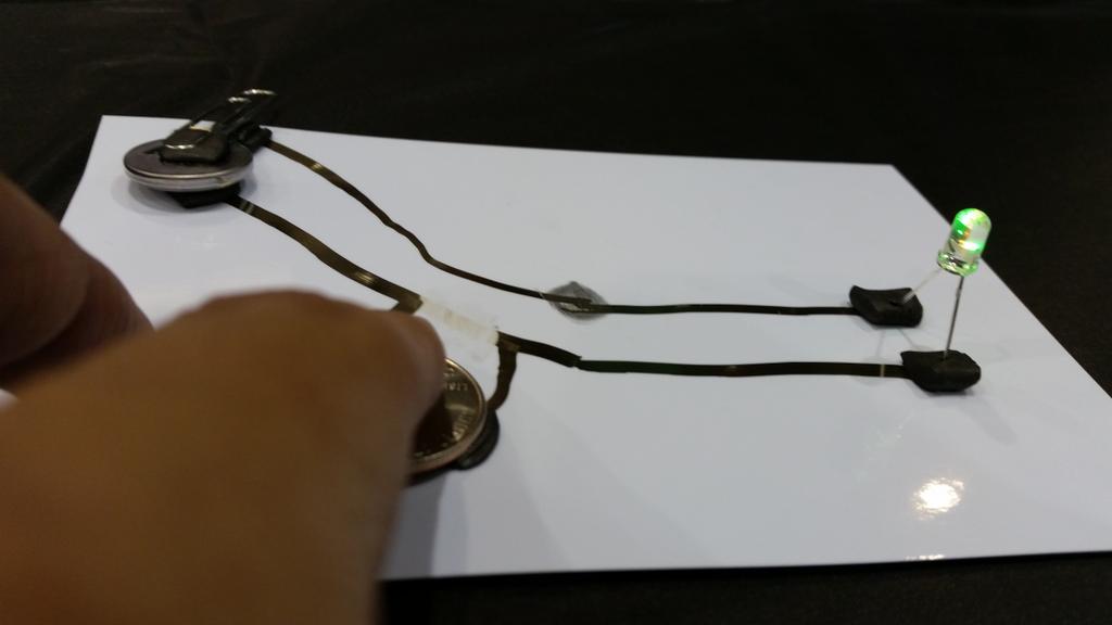 Conductak's tweet photo. Momentary push button for pocket change, literally! Clever use of everyday materials and #Conductak by a 10 year old! http://t.co/MU1OU7YhIp