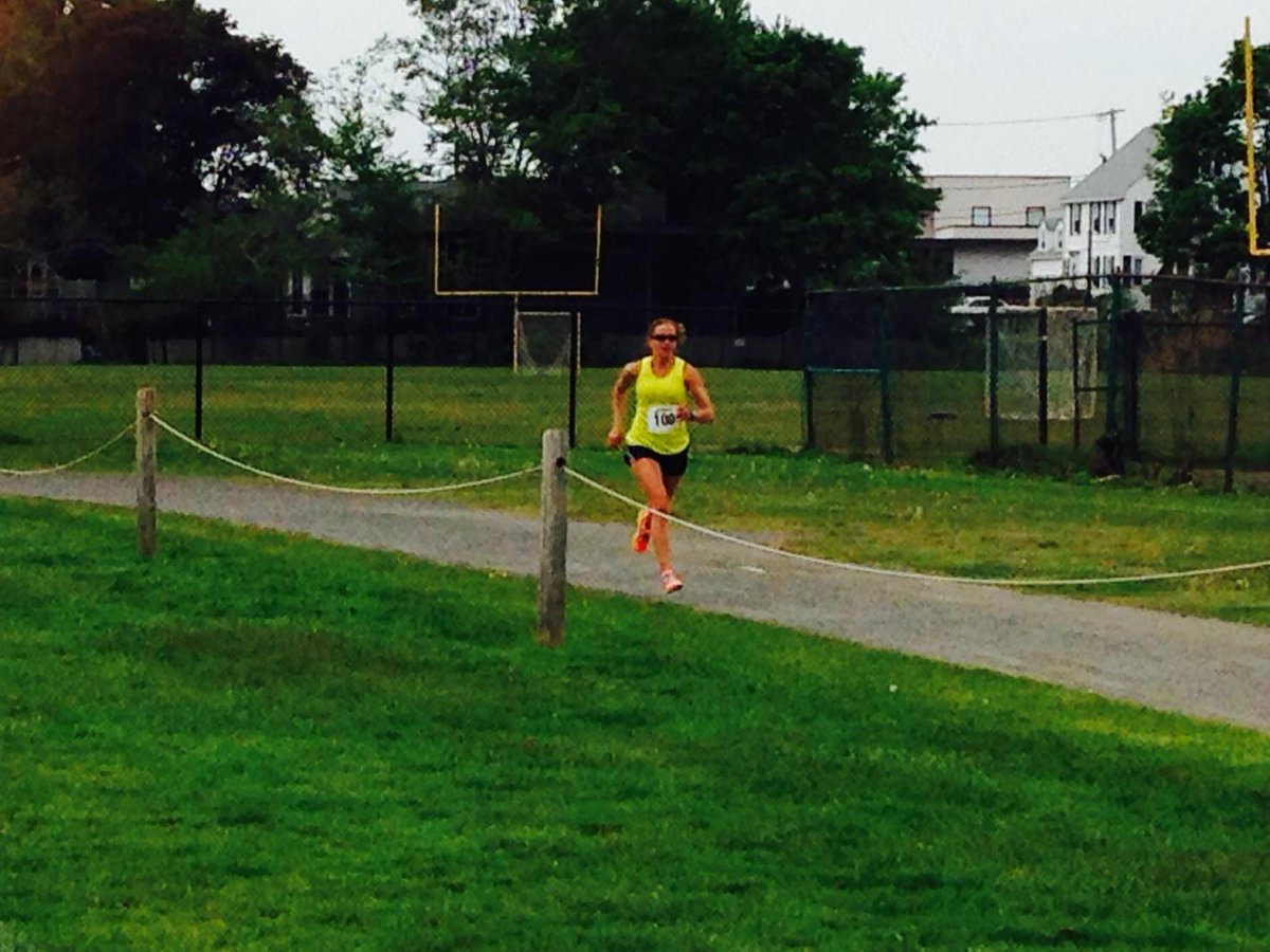 Finishing strong at the Dory Run 5k. Thanks to <a href="/craftofsweden/">Craft Sportswear US</a> you can spot me from a mile away!