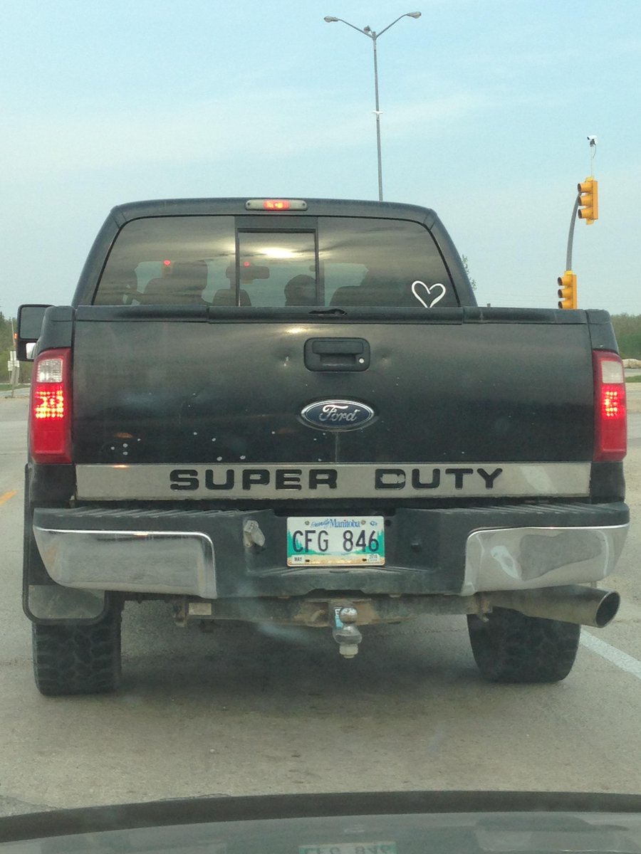 InterlakeNews's tweet photo. SUPER CUTY -Seen on Hwy #67 &amp; #7 at the stop light this morning. Paint chip in the perfect spot! The guy has no idea! http://t.co/zrGXS2PynL