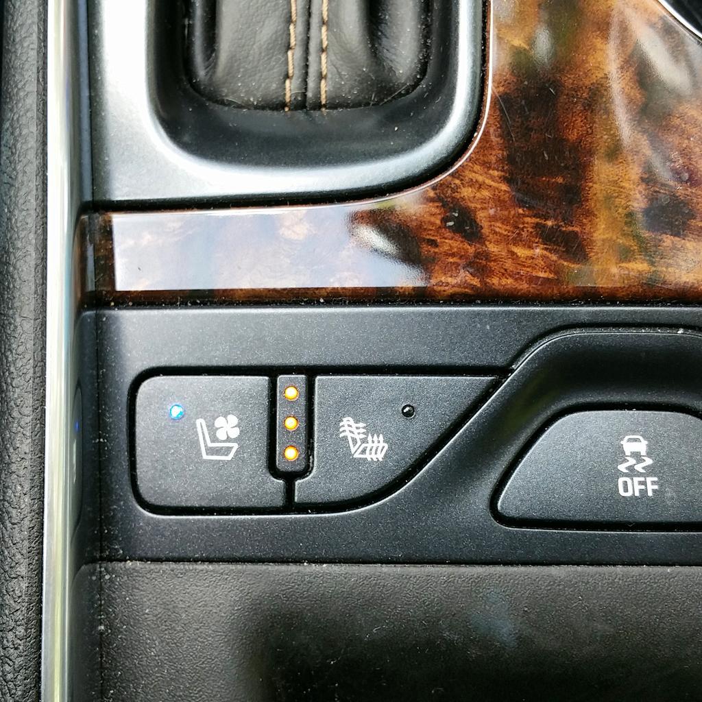 PCMPhones's tweet photo. In-car WiFi rocks,  but my favorite tech in our 2015 Chevy Impala is this fanny-cooler button, bottom left. #fmneast http://t.co/0pHGQrrhRH
