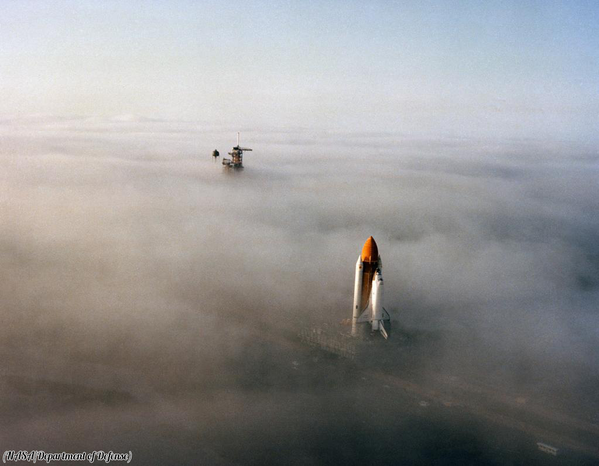 ThatsHistory's tweet photo. The Space Shuttle Challenger at a foggy Cape Canaveral, 1984 http://t.co/63IKHq9AAU