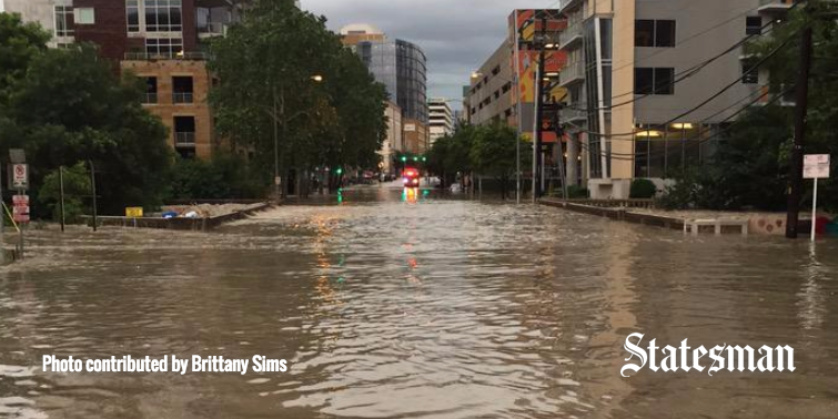 statesman's tweet photo. Flooding now widespread through Central Austin http://t.co/8SONXBTfxA #atxfloods http://t.co/t1jJc4dhwU