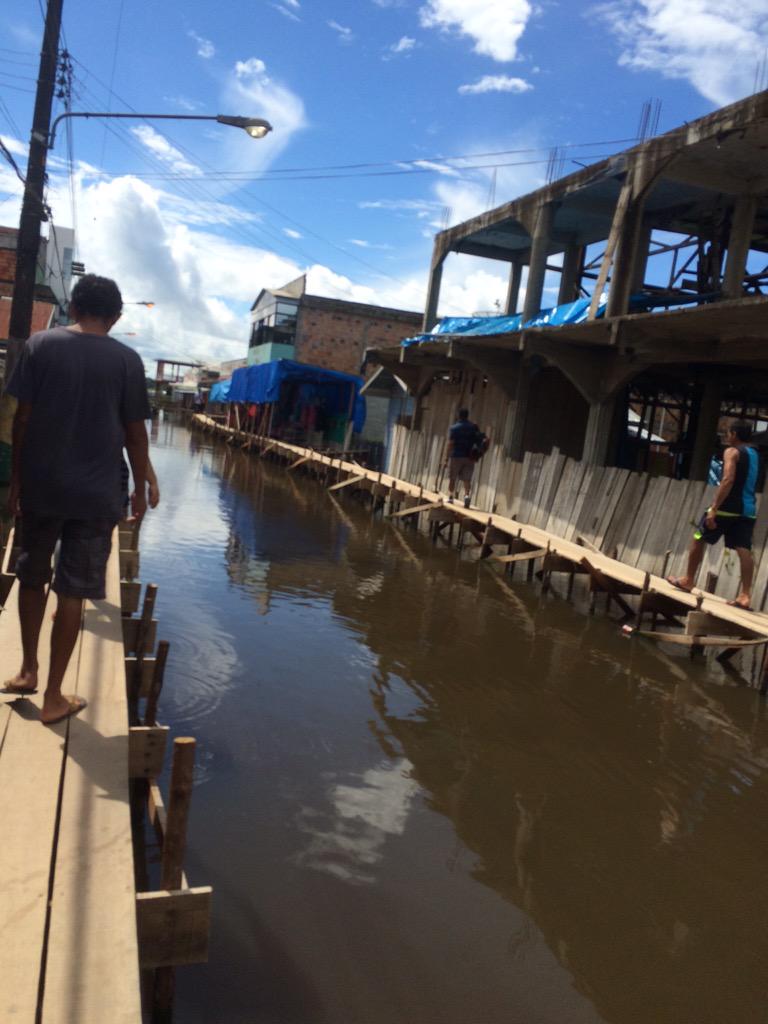 ryanmustered's tweet photo. Devastating floods and makeshift sidewalks. #amazon http://t.co/rWIjyhaMeW