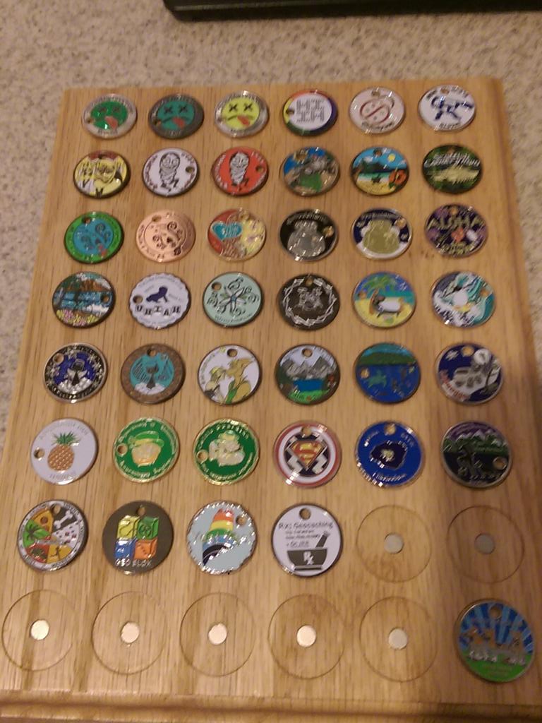 HopelessCacher's tweet photo. New pathtag board is almost full!! @pathtax @GoGeocaching http://t.co/jqGSajC65O