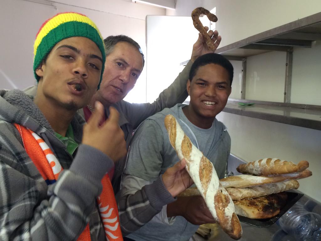 BREADrev's tweet photo. #AfricaDay and we get to bring skills & cash earning opp to students at #communiversity in Vygrond. #baking4change http://t.co/LoG3WPOacB