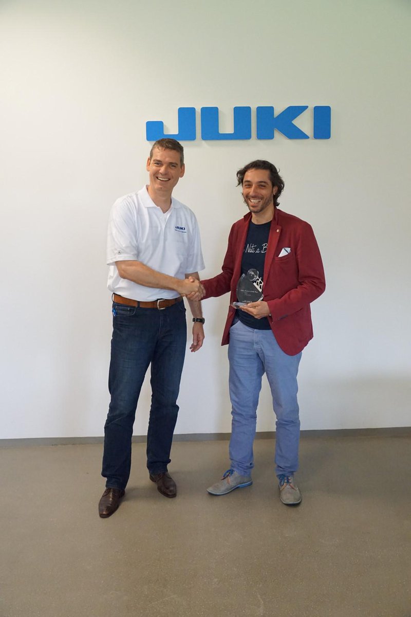 Premiati dal presidente Jens Mireau di Juki Europe come 'Miglior Distributore Juki a livello europeo 2014'.