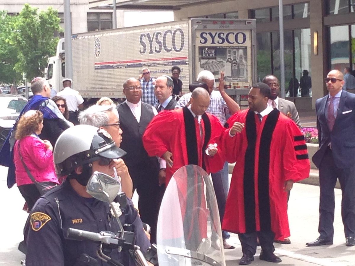 AdamFerrise's tweet photo. Rev. Colvin set to lead March to Justice Center, City Hall #CLEprotests http://t.co/mzLwoQEx6A