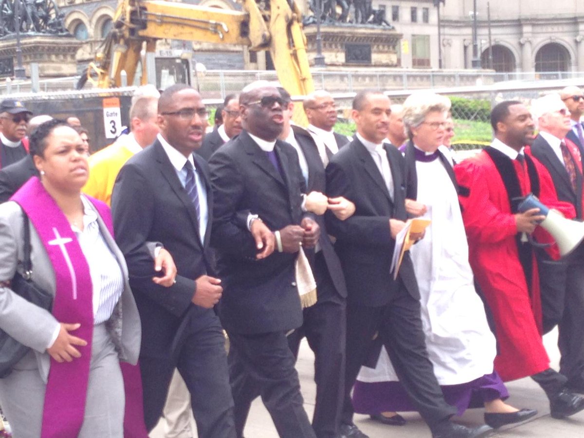 AdamFerrise's tweet photo. Cleveland councilman among hundreds marching towards Justice Center #CLEprotests http://t.co/sMAUd5eCae