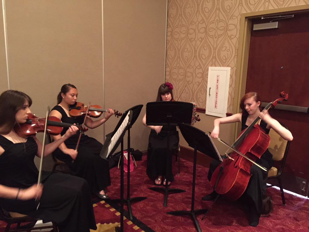 Chrisman Orchestra students getting ready to play at the district retirement banquet.  #isdstrong