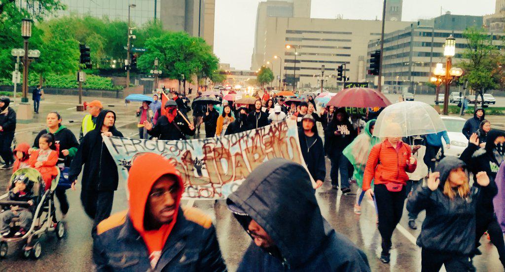 UR_Ninja's tweet photo. The #Justice4Taye march was led by Taye (10 y/o pepper spray victim) &amp; he closed w/ the Assata chant. #MPLS2Madison http://t.co/bv9jA7oGU7