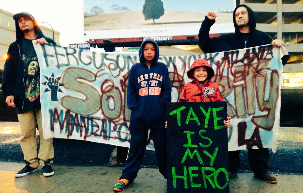 UR_Ninja's tweet photo. The #Justice4Taye march was led by Taye (10 y/o pepper spray victim) &amp; he closed w/ the Assata chant. #MPLS2Madison http://t.co/bv9jA7oGU7
