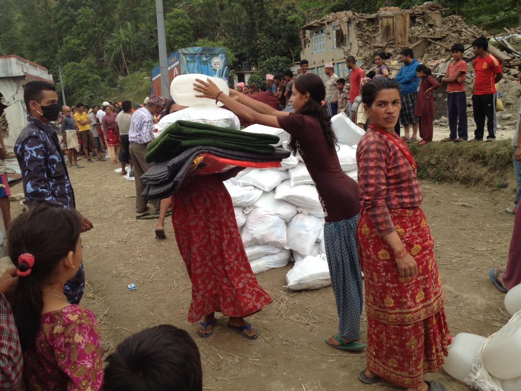 concern_dom's tweet photo. @Concern distribution happening right now in nepane, tamaralang VDC, Sindhupalchowk! http://t.co/Ev3VvIE4te