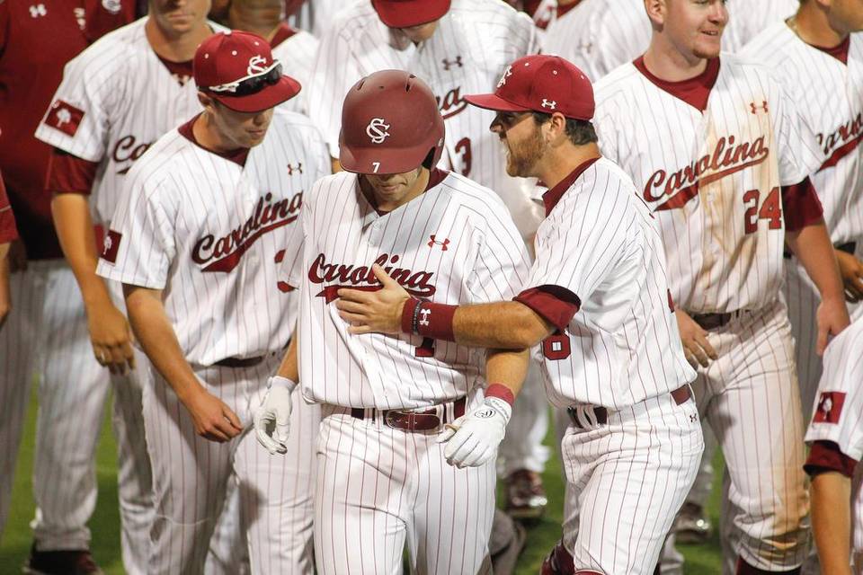 gogamecocks's tweet photo. Gamecocks rally behind loud crowd to stun No. 1 LSU 10-7 in series opener http://t.co/Xpdkrq6ttL http://t.co/fyJ1Mf6a4i