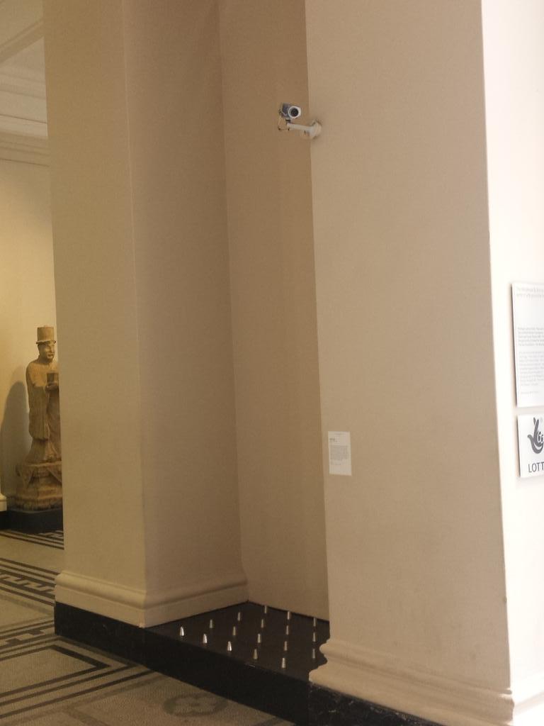 V_and_A's tweet photo. #antihomelessspikes as defensive architecture. Carefully chosen alcove with CCTV camera for added bite! #TwitterTour http://t.co/aSUZ3WoAlv