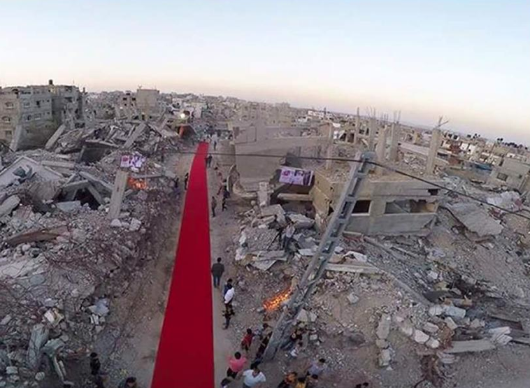 LeilZahra's tweet photo. Red carpet #Gaza #HumanRights #Film Festival 2015 in the middle of #Israel's #OpProtectiveEdge destruction #Palestine http://t.co/QNxpYUcTqY