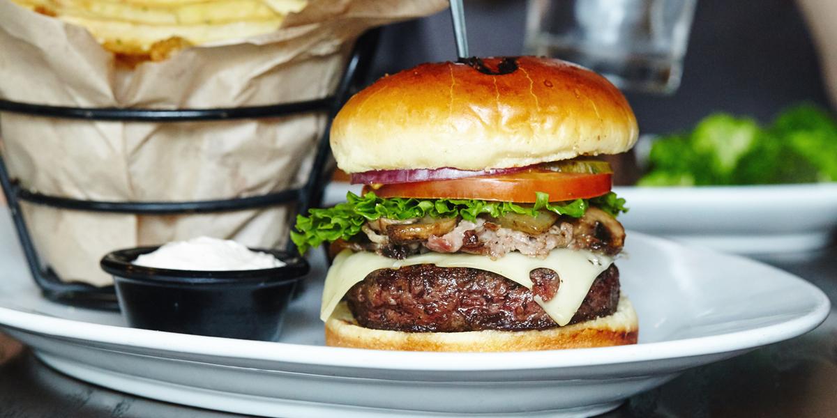 LongHornSteaks's tweet photo. Shaved prime rib + half pound burger = match made in primetime. #PrimetimeBurger http://t.co/rEiL0WpTRz